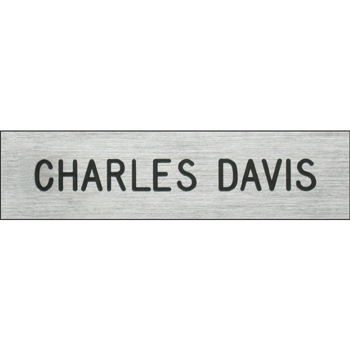 Plastic silver name plate.